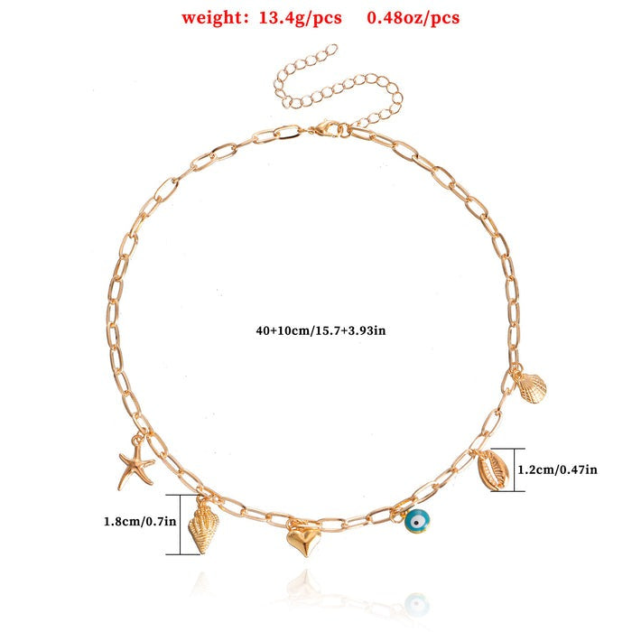 Salty Opulent Gold Tassel Charm Necklace