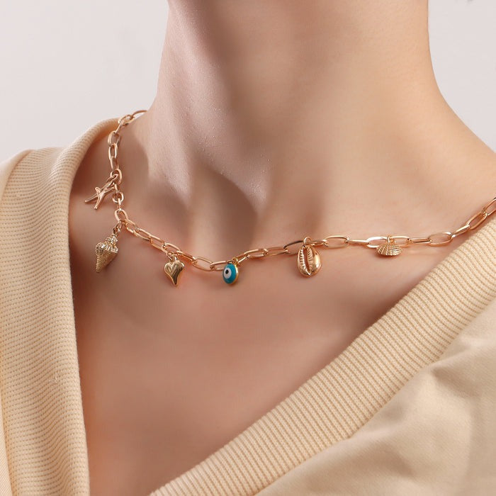 Salty Opulent Gold Tassel Charm Necklace