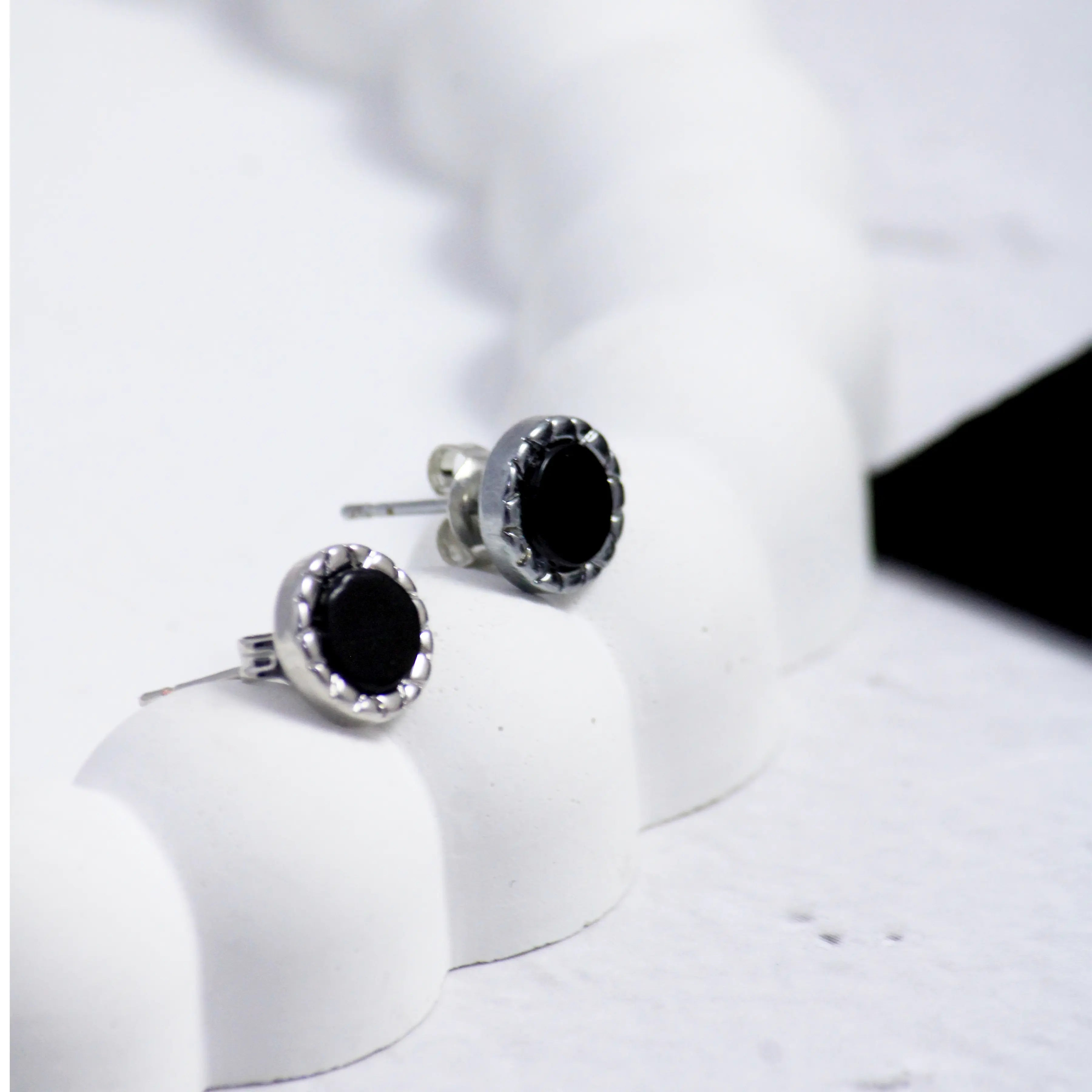 Salty Black Beaten Studs