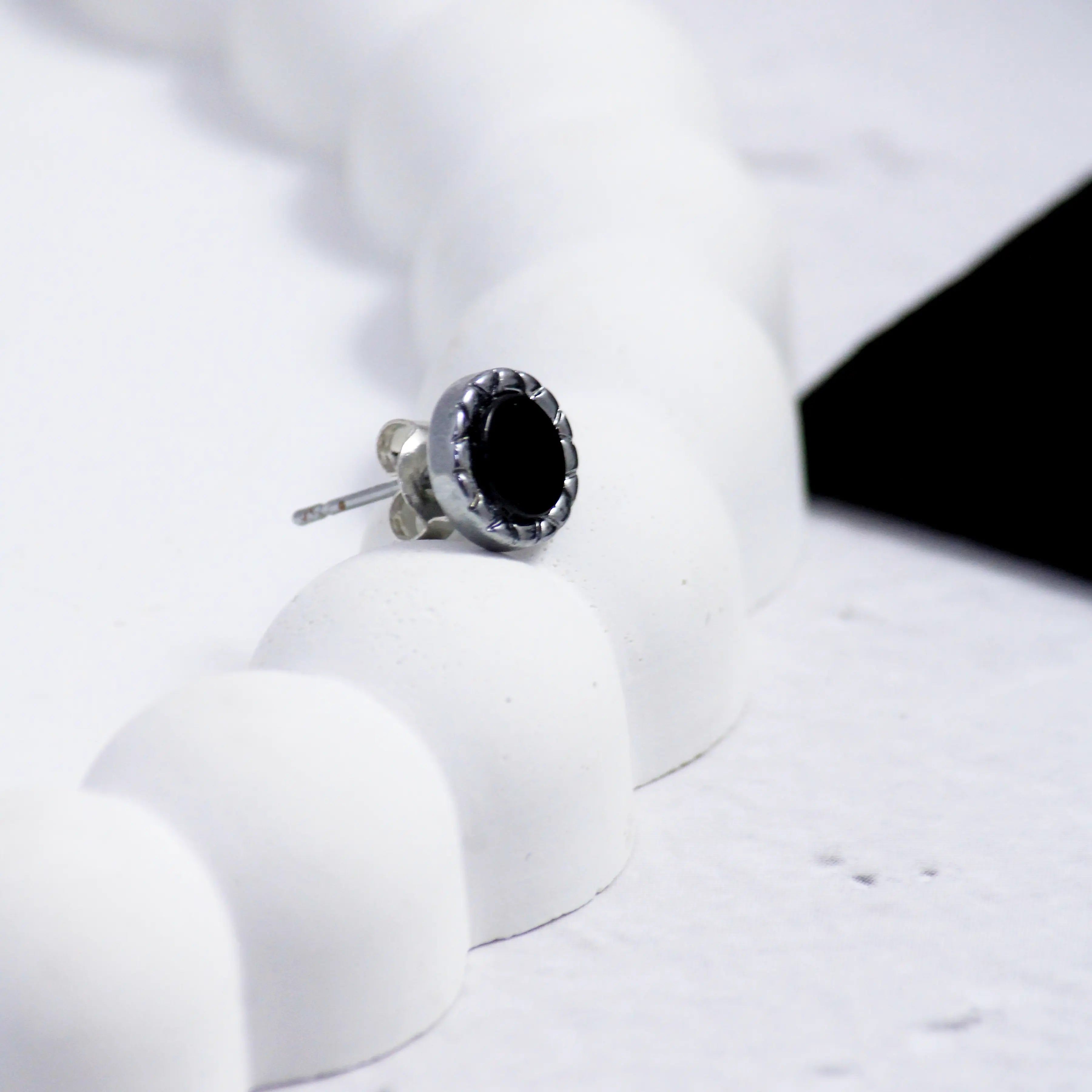 Salty Black Beaten Studs