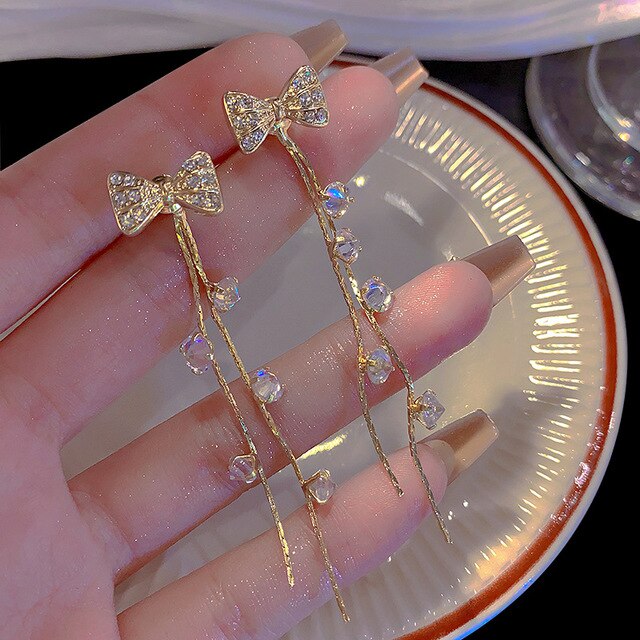 Salty Lusty Bow Tassel Earrings
