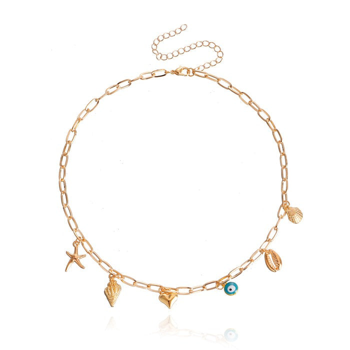 Salty Opulent Gold Tassel Charm Necklace
